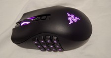 Used Wireless razer naga mmo gaming mouse. Scratch on grip